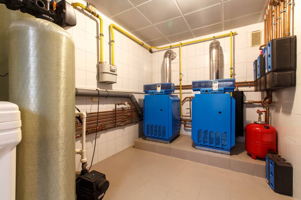 blue gas boiler in a basement.
